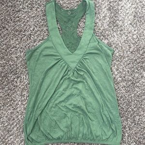 Green racerback tank with lace back